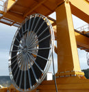 Motor driven cable reeling drums